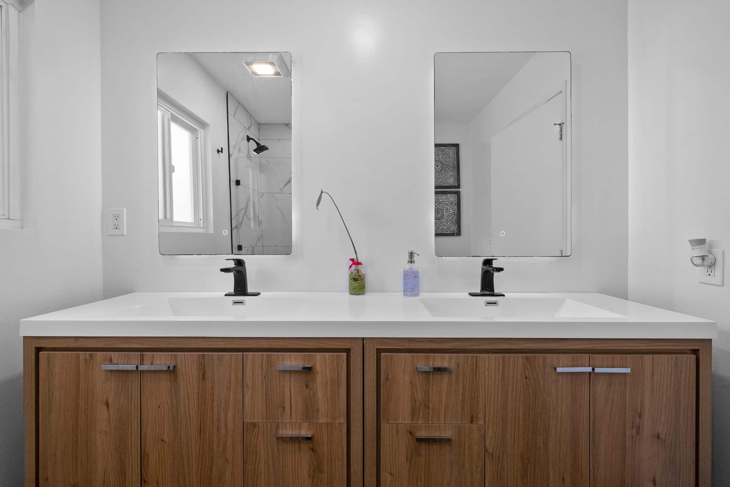 Double vanity with matte-black fixtures