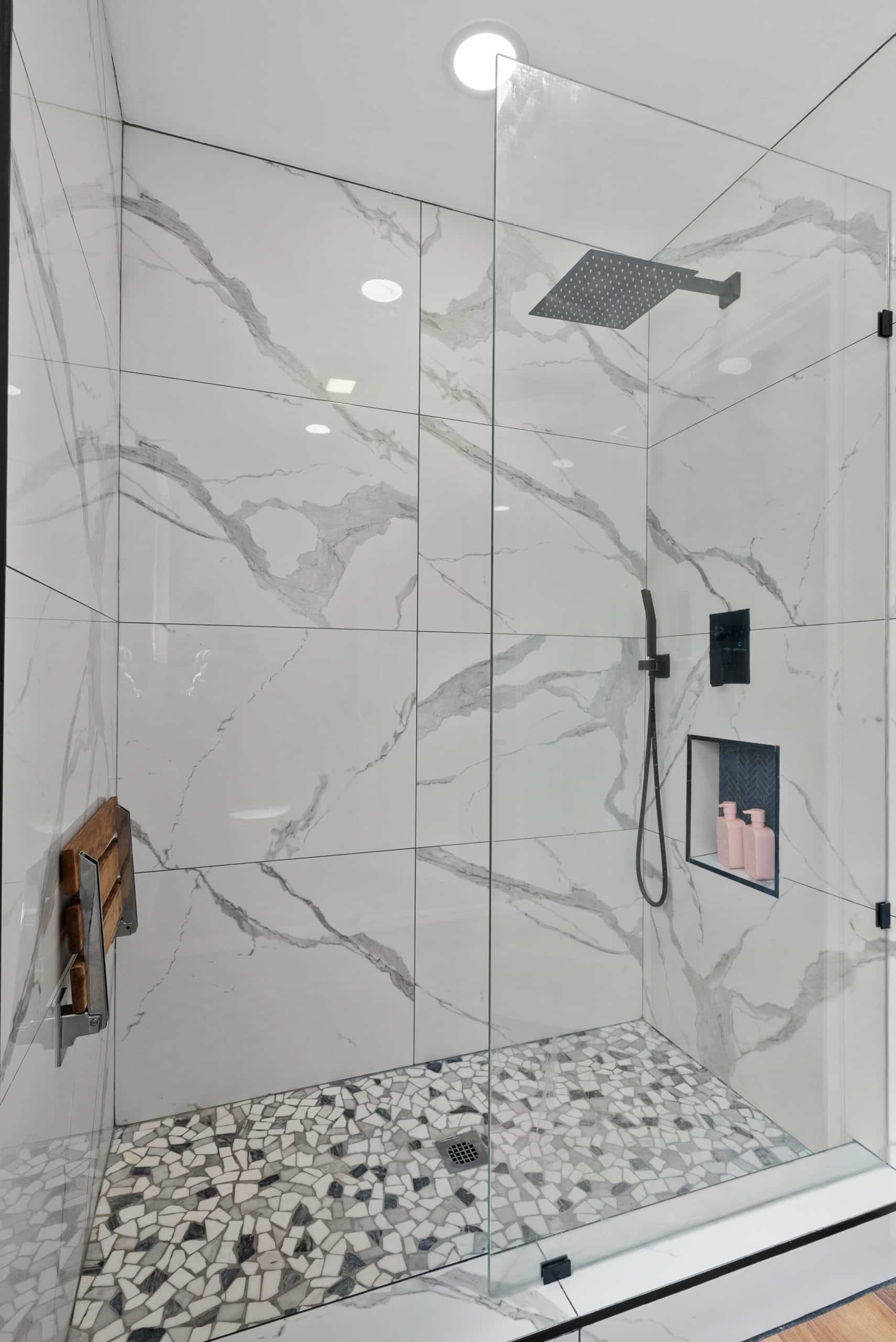 Marble walk-in shower with rainfall head