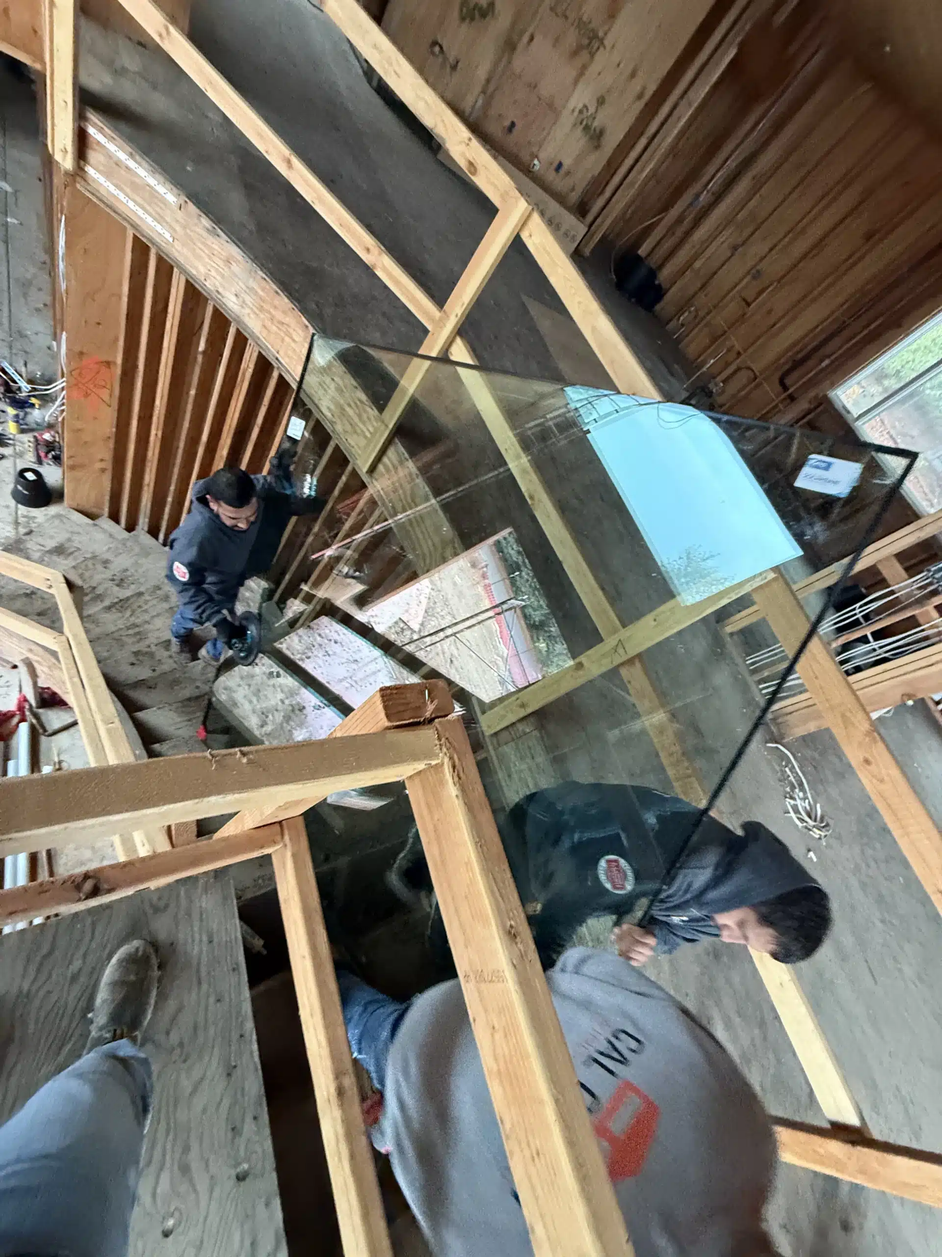 Framing and structure under construction, Lafayette hillside