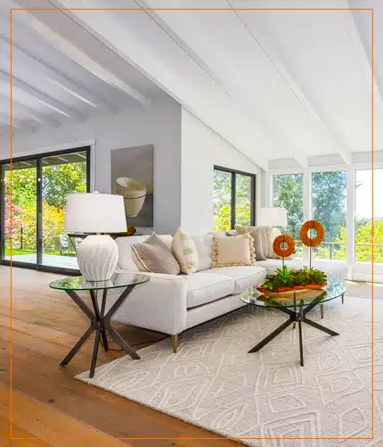 couch interior design with glass table and plants