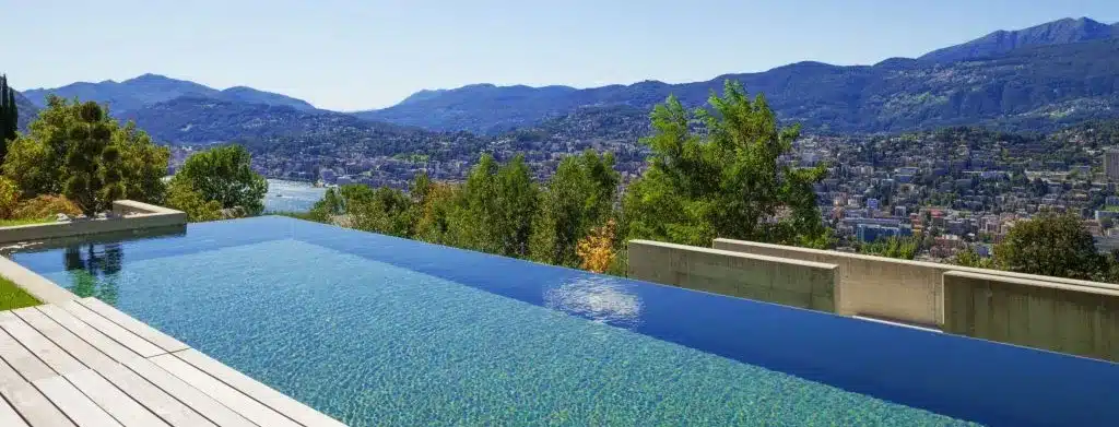 outdoor infinity pool with a mountain view