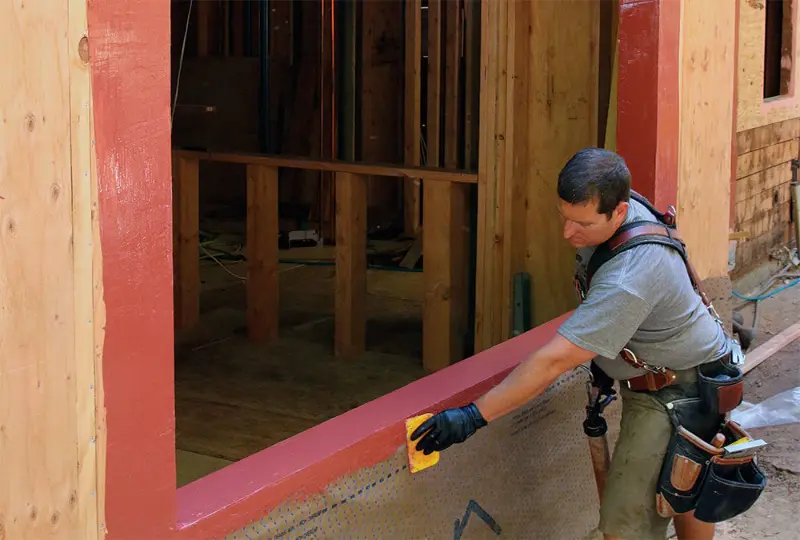 man working on a brand new custom window