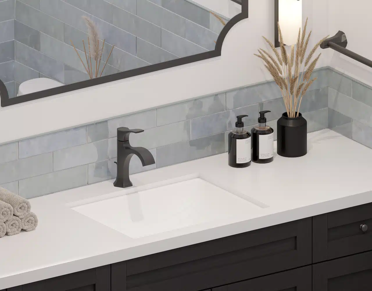 Fremont bathroom remodel — quartz-topped vanity and matte-black faucet detail