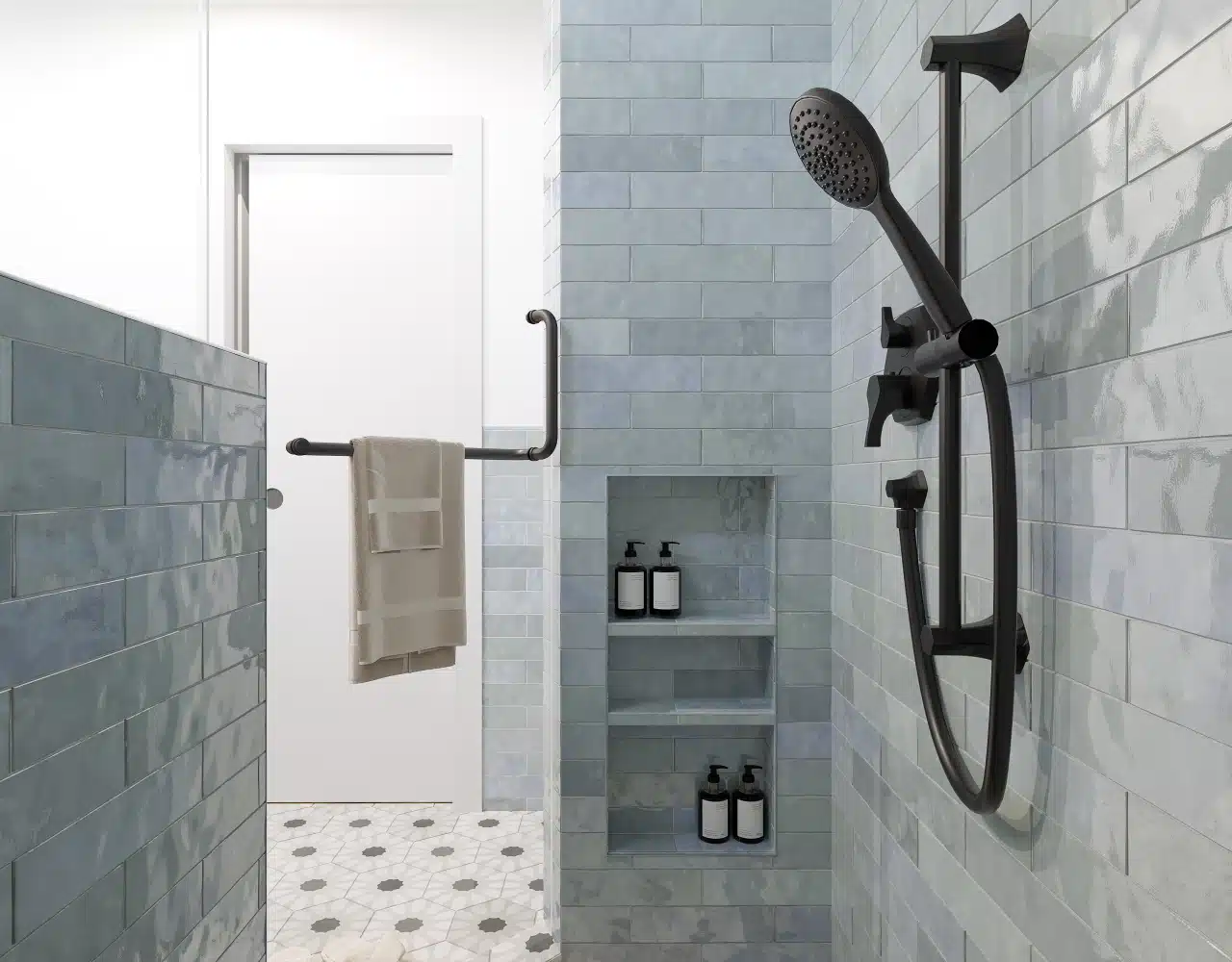Fremont bathroom remodel — walk-in shower with niche shelving and matte-black fixtures