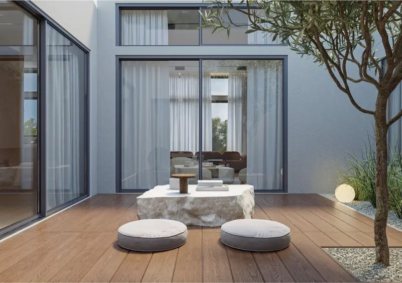 Alamo remodel — interior courtyard with olive tree, deck and stone table