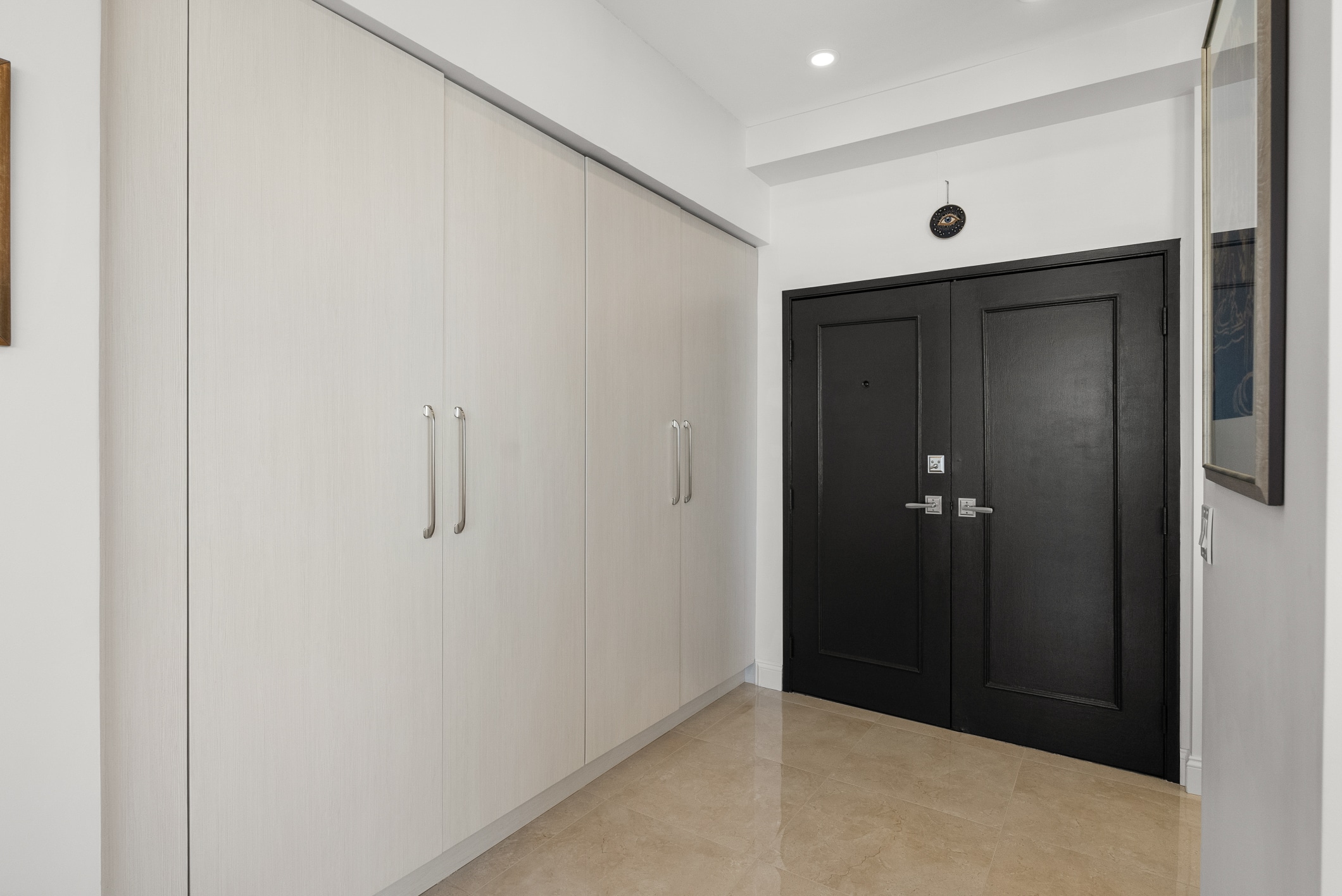 Lafayette remodel — custom entry storage wall and foyer