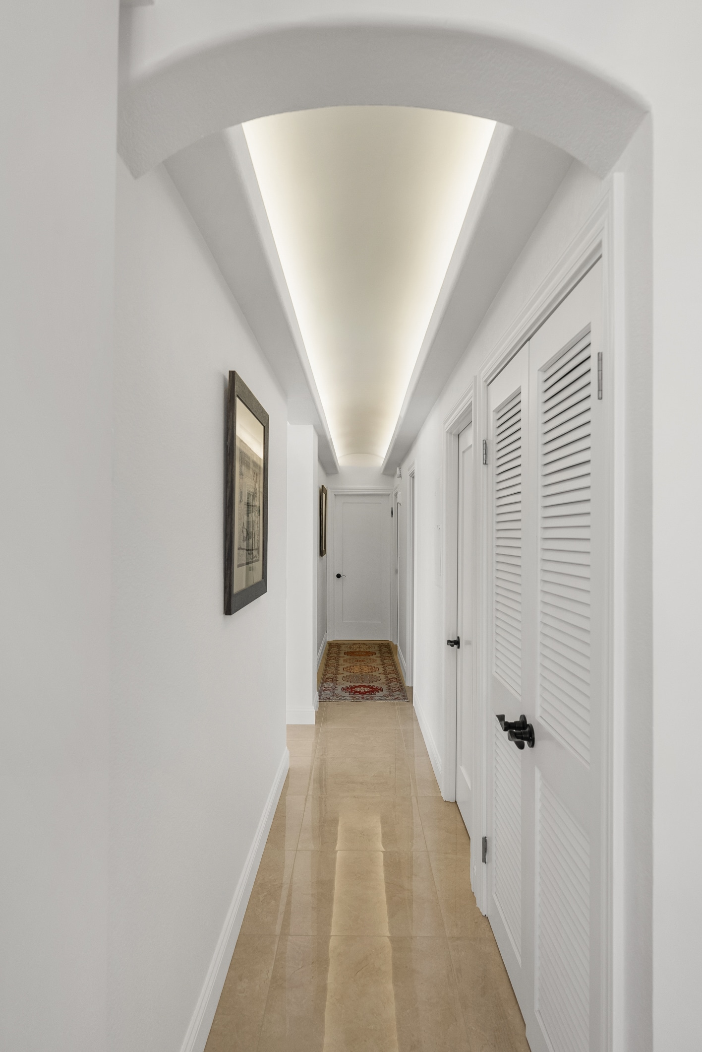 Lafayette remodel — arched hallway with architectural cove lighting