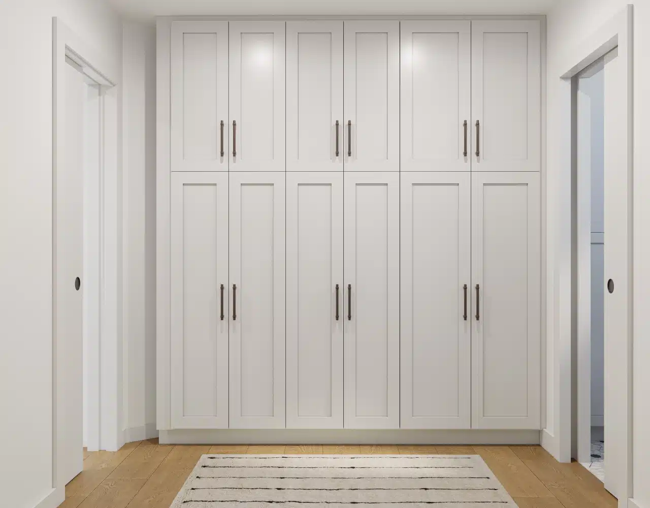 Fremont remodel — floor-to-ceiling custom storage cabinetry wall