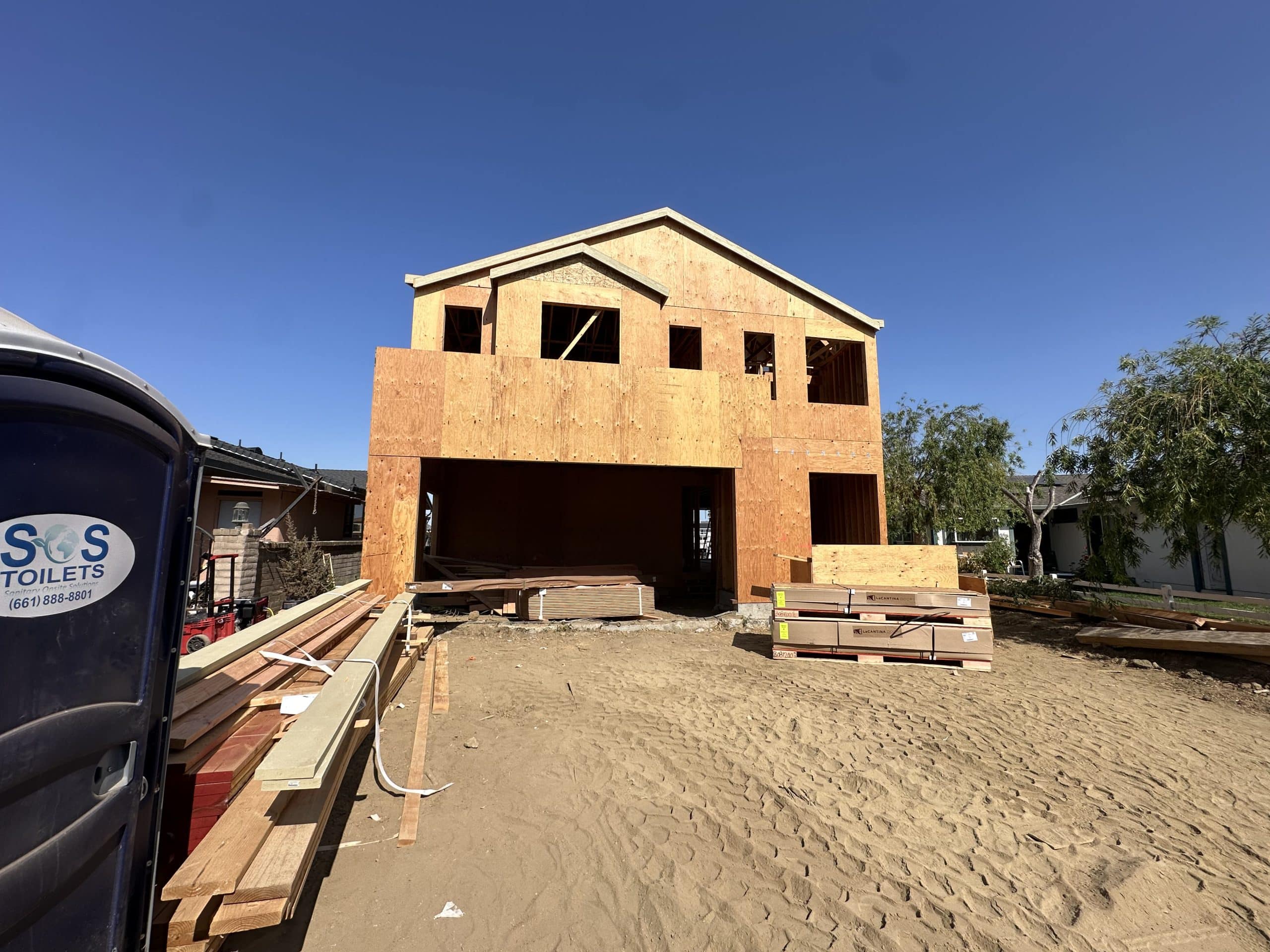 Two-story custom home framing under construction in Lafayette
